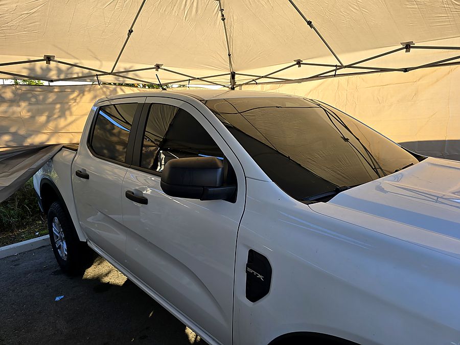 Ford Ranger STX — full ceramic tint, installed on site under our canopy