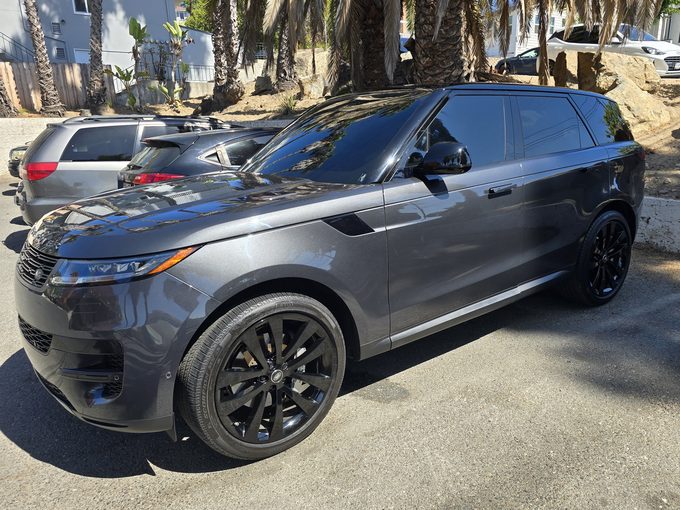 Range Rover Sport — window tint, black wheels