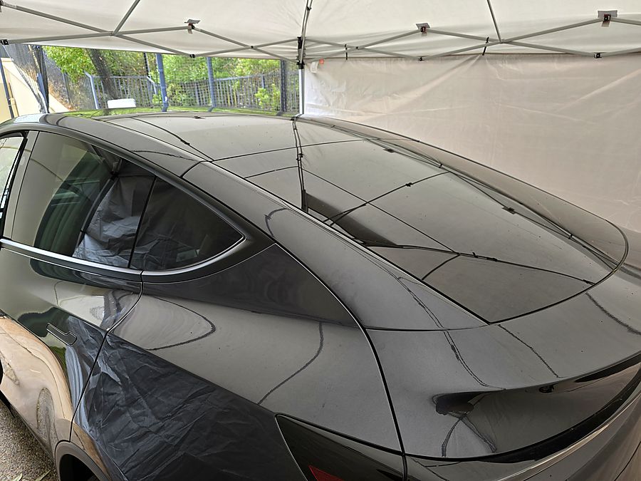 Tesla glass roof — one-piece film on the panoramic panel, no seams